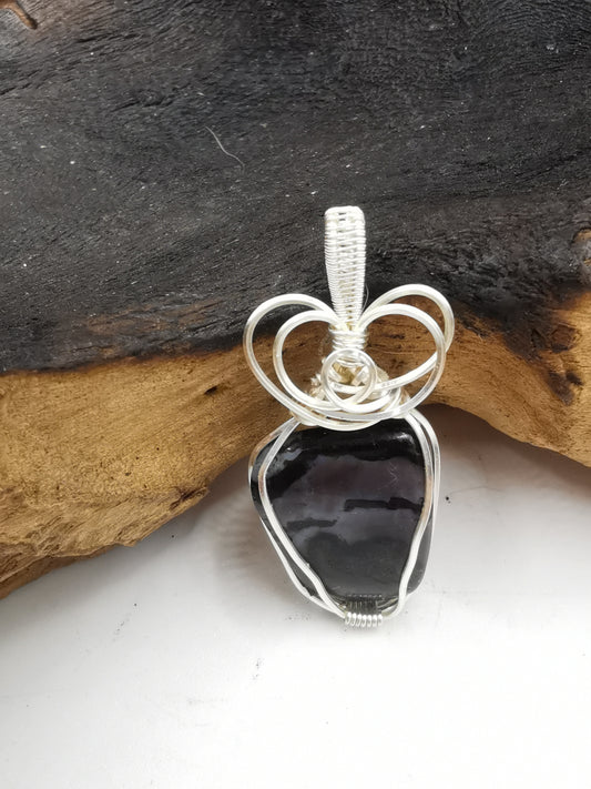 Merlinite B Crystal Pendant